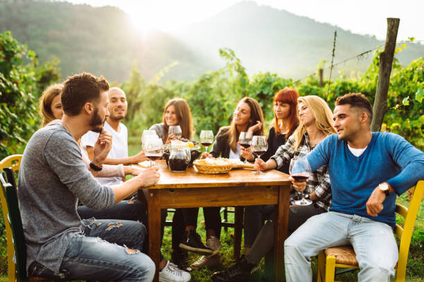 istock friends doing a wine tasting all together 1176937329