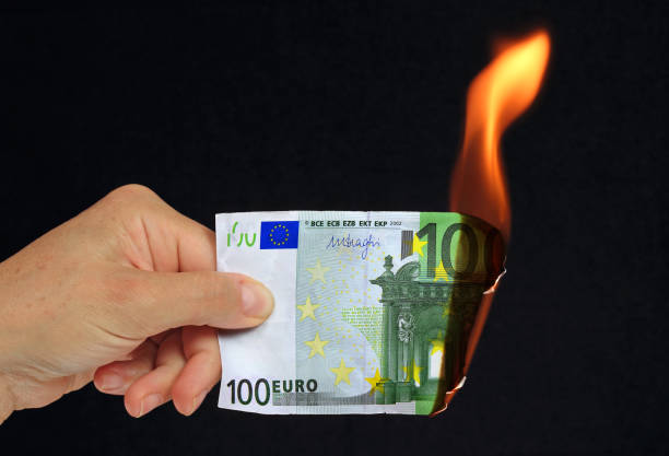 istock Banknote 100 euros hand conceptual 1176939079