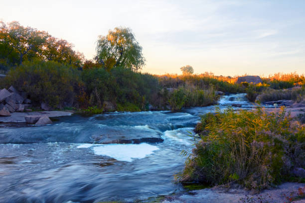 istock river rushing through a canyon at the sunset 1176942784