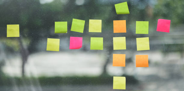 istock Colourful sticky note on the glass wall in modern office 1176942930