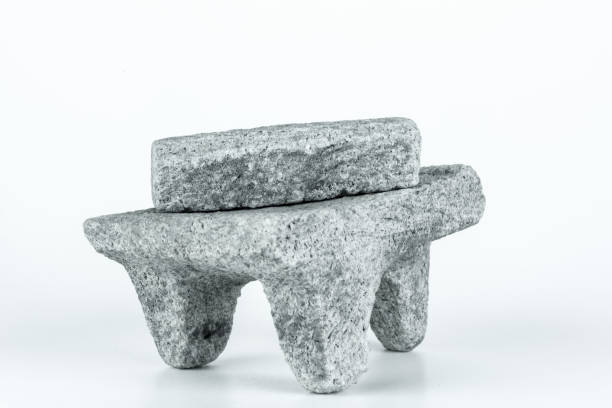 istock Traditional grinder stone artifact of the mexican cuisine, called metate 1176945607