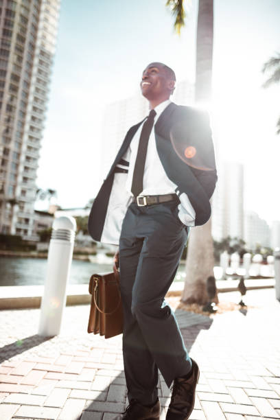 istock businessman make a phone call in miami 1176945970
