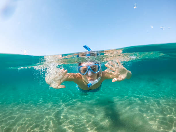 istock Snorkeling and having fun in the sea 1176947608