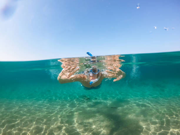 istock Snorkeling and having fun in the sea 1176947665
