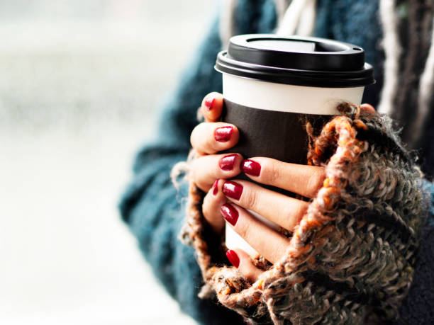 Hot Coffee, Takeaway Coffee, People hand holding paper cup of take away Coffee,Warming Up with a Coffee, Coffee Cup, Coffee - Drink, Cup, Human Hand,winter,Breakfast,Take Out Food,  Human Hand,Disposable Cup, decaffeinated photos stock pictures, royalty-free photos & images