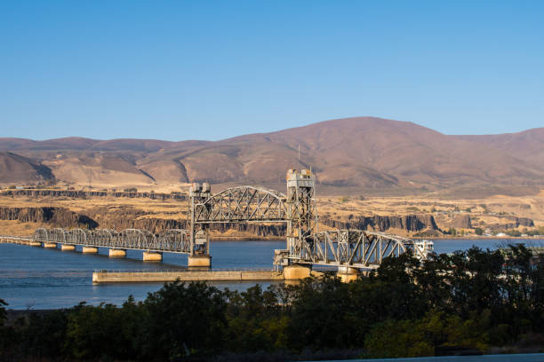 istock A cargo ship passes under the Oregon Trunk Rail Bridge on the Columbia River 1176952865