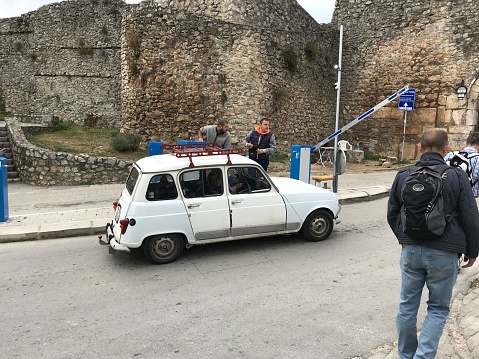 Ohrid, Macedonia, - September 21, 2019. Vintage Car with people in the city of Ohrid.