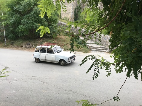 Ohrid, Macedonia, - September 21, 2019. Vintage car wreck in the country side.