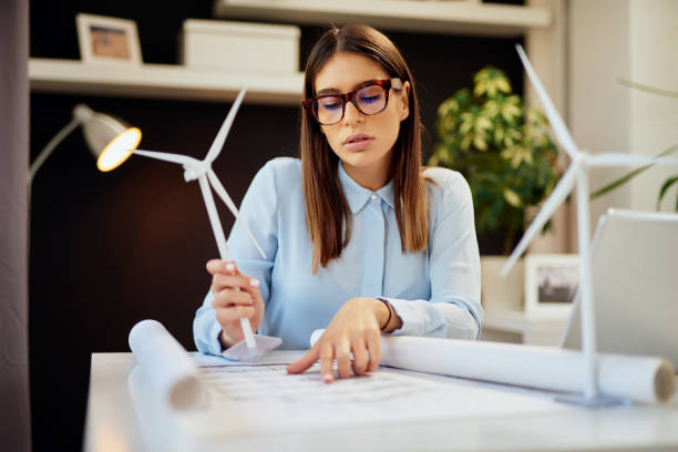 istock Busineswoman working on sustainable development. 1176956174