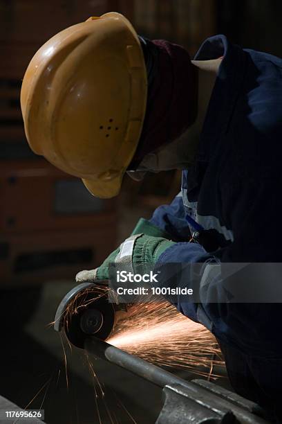 Foto de Grinding Com Sparks e mais fotos de stock de Artigo de vestuário para cabeça - Artigo de vestuário para cabeça, Capacete - Equipamento, Capacete de trabalho