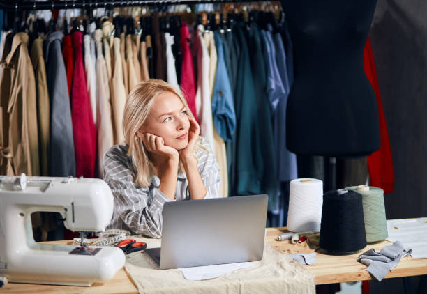 istock romantic lovely girl thinking about her successful business, 1176958524