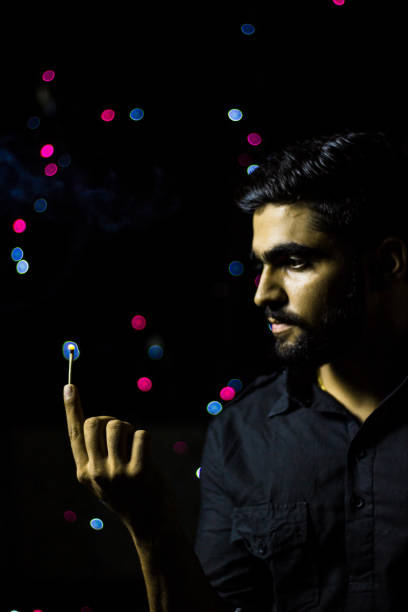 istock Young handsome guy with diwali diya(oil lamp) 1176963285
