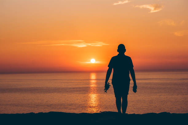 istock Silhouette of man with drone 1176965667