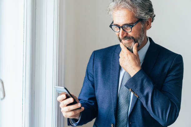 istock Businessman with smartphone 1176965891