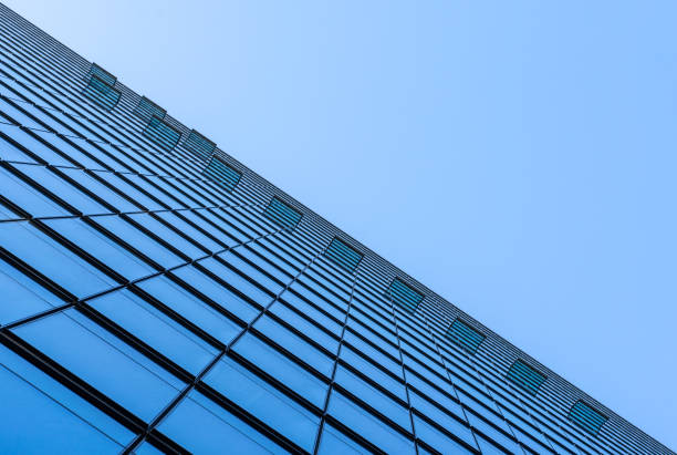 istock Low Angle View Of Modern Building Against Clear Blue Sky 1176966707