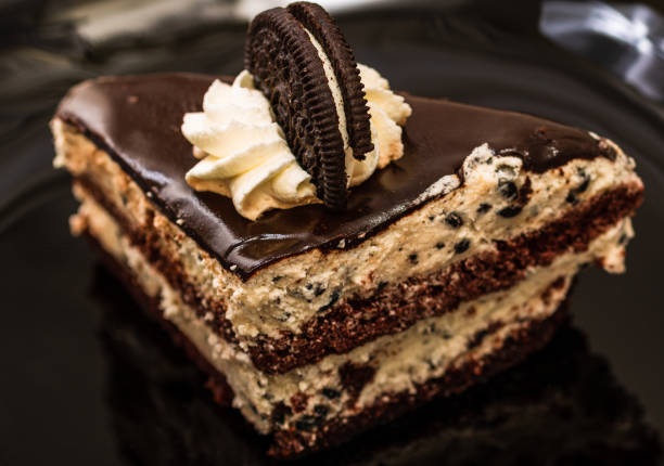 istock Creamy cheesecake with chocolate cookies and cream biscuits. 1176970933