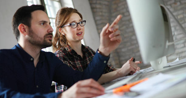 istock Portrait of young designers working on computer 1176971342