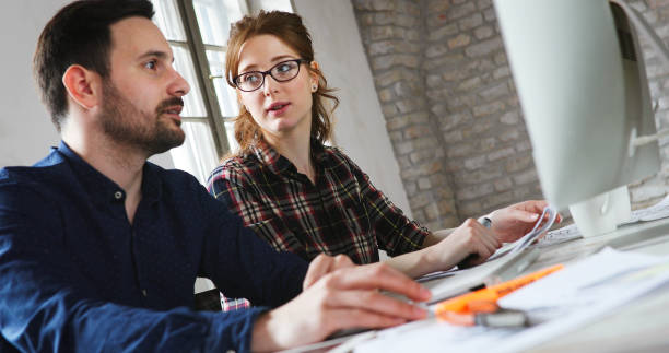 istock Portrait of young designers working on computer 1176971375