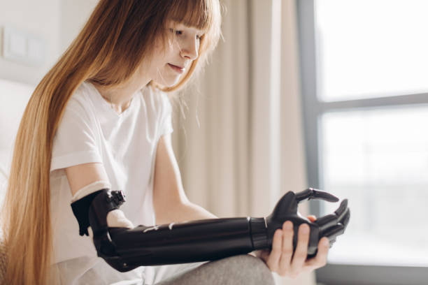istock pensive serious girl having a cyber arm 1176972092