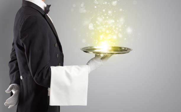 istock Waiter serving mysterious light on tray 1176972137