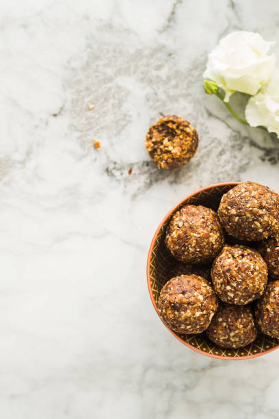 istock Energy balls with healthy ingredients on marble 1176972307