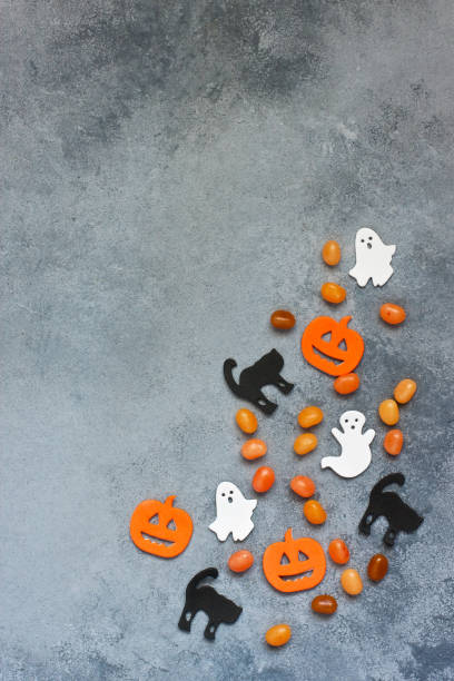 istock Halloween decorations  and candies on   color  background 1176972538