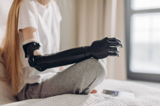 istock close up cropped photo. focus on the iron robotic arm 1176972706