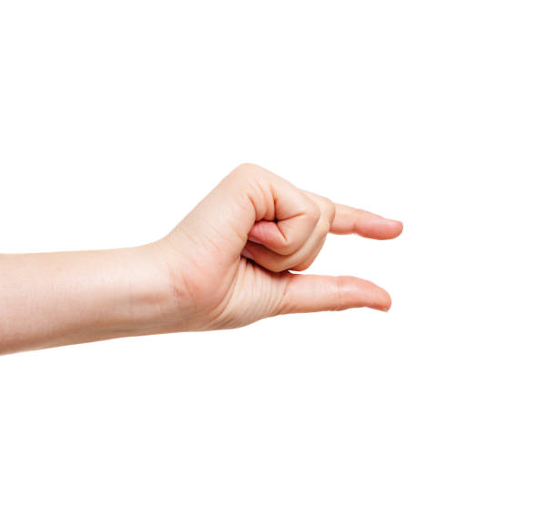 A woman's hand is held out with finger and thumb a little way apart, indicating the size of something unseen.