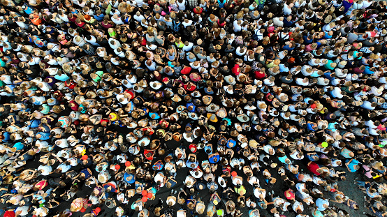 People crowd texture background. Top view from drone.