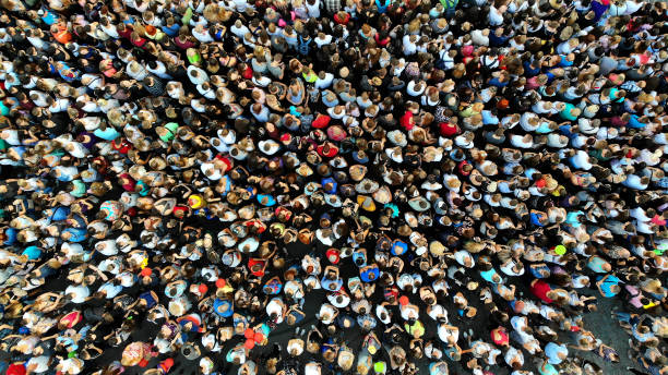 People crowd texture background. Top view from drone. stock photo