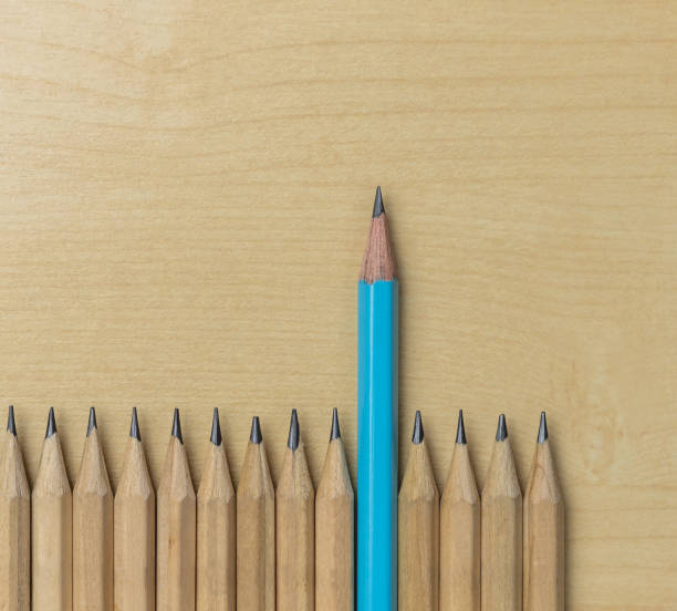istock Different pencil standout show leadership concept. 1176974562