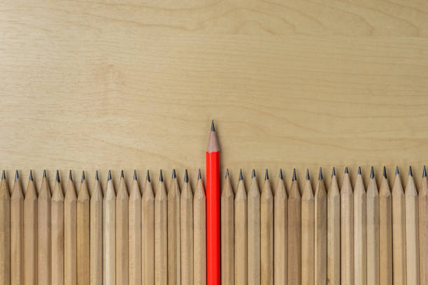 istock Different pencil standout show leadership concept. 1176974581