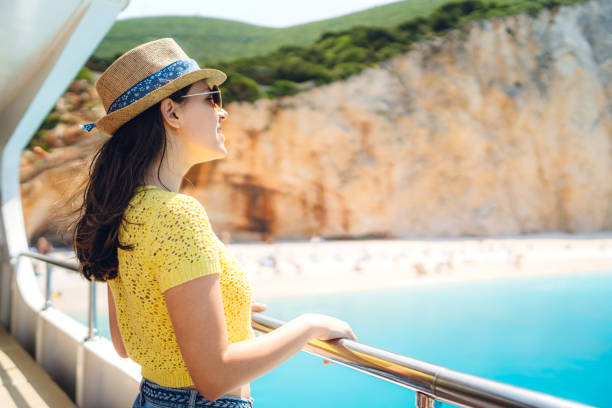 istock Young woman on a boat ride 1176975974