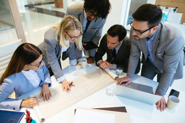 istock Successful business team working on a project in the office 1176977581