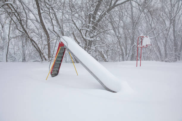 Playground equipment buried in snow during a blizzard that left over three-feet of snow in New York State.
