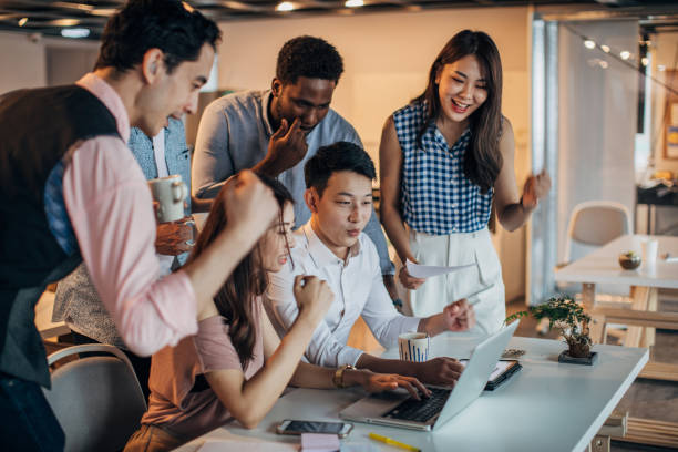 istock Group of colleagues in modern office 1176979244
