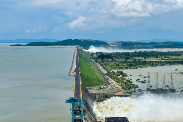 Hirakud Dam in India, Longest dam in the asia, aerial view Hirakud Dam in India, Longest dam in the asia, aerial view during dam gates opened to release flood water odisha stock pictures, royalty-free photos & images