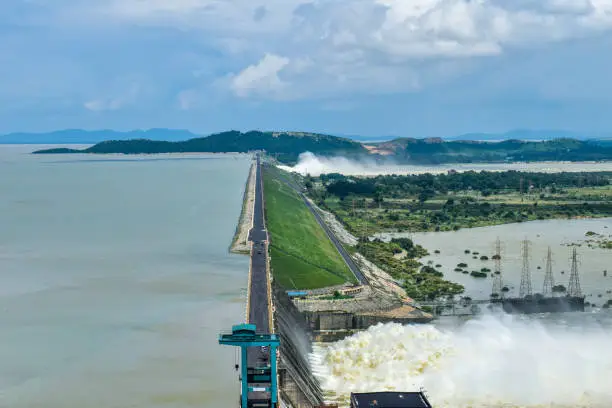 Hirakud Dam in India, Longest dam in the asia, aerial view during dam gates opened to release flood water