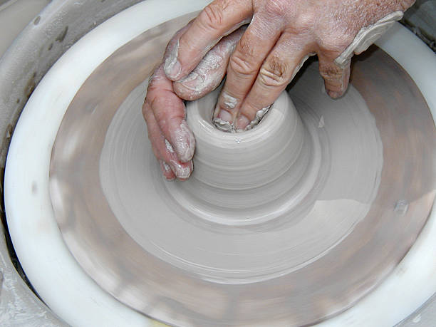 istock throwing a bowl on potters wheel 1 of 5 117698049