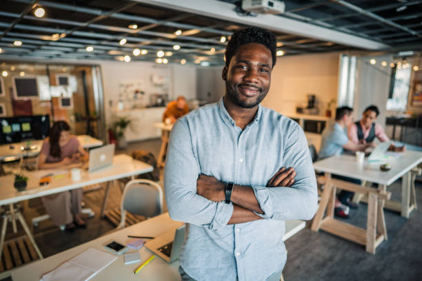 istock Charming black gentleman in office 1176982234