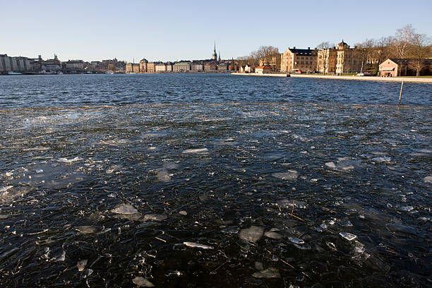 Stockholm in winter Wide angle view of Blasieholmen with icy water of Strömmen in the foreground. strommen stock pictures, royalty-free photos & images