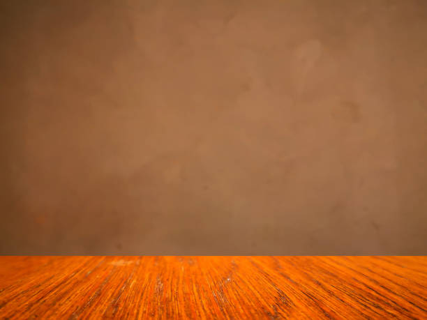 istock Empty top shelves or table wood on concrete wall background. . 1176986041