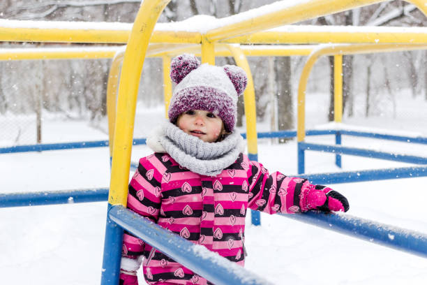 istock Little girl at winter. 1176987361