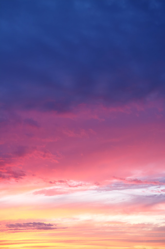 Cloudscape - photo of a picturesque sunset - sunset in pink and purple colors.