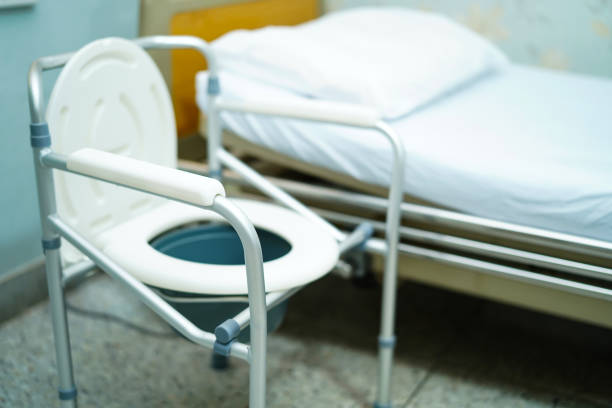 istock Commode chair or mobile toilet can moving in bedroom or everywhere for elderly old disabled people or patient : healthy strong medical concept 1176997961
