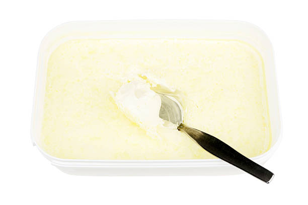 istock Clotted Cream In Tub With Spoon 117700286