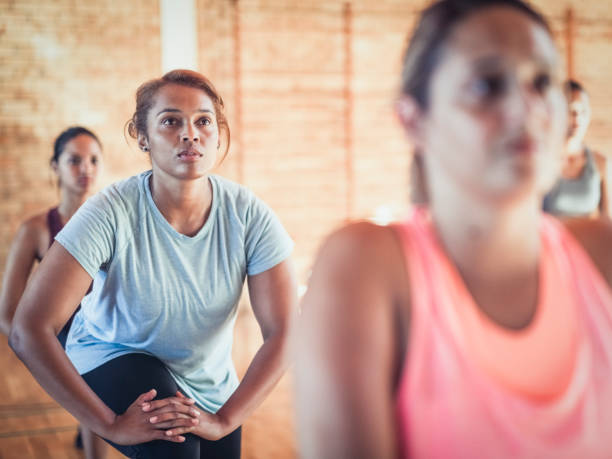 istock Female team training together indoor. 1177014339