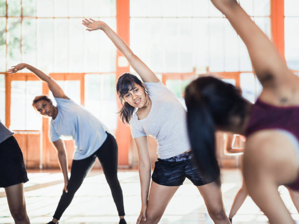 istock Group of women training aerobics together with instructor 1177014578