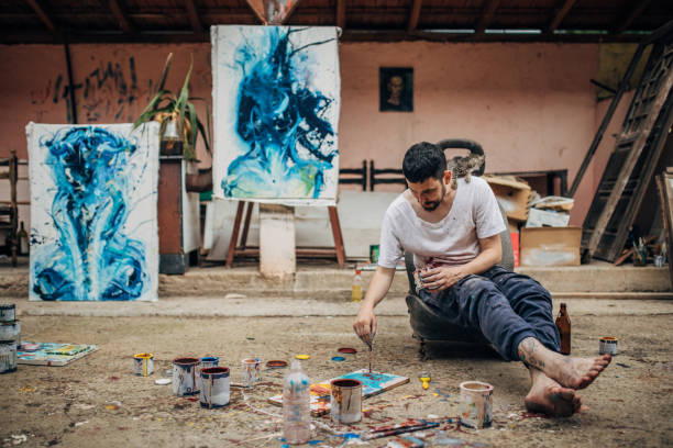 istock Young artist painting 1177014963
