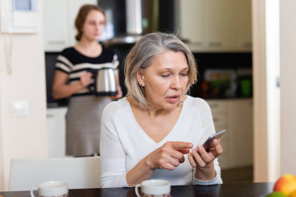 istock Mature woman using phone 1177019344